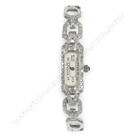 A lady’s platinum and diamond cocktail watch