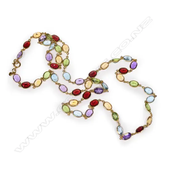 An 18ct and multi gemstone set necklace