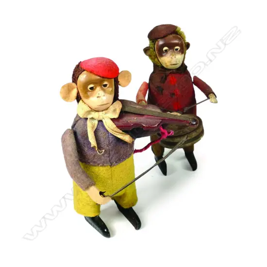 A pair of vintage Schuco clockwork toys