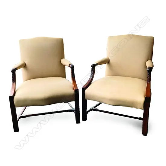 A pair of good quality reproduction Gainsborough open elbow chairs of generous proportions