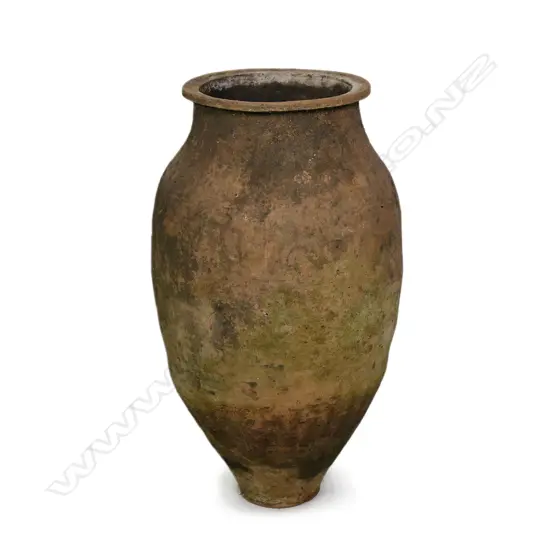 An old European terracotta tall olive oil storage jar