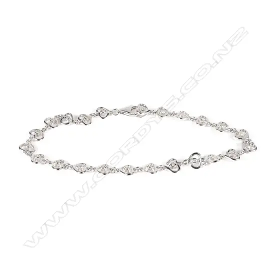 An 18ct white gold and diamond bracelet