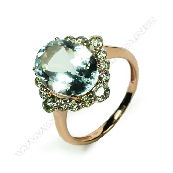 A 14ct rose gold aquamarine and diamond ring