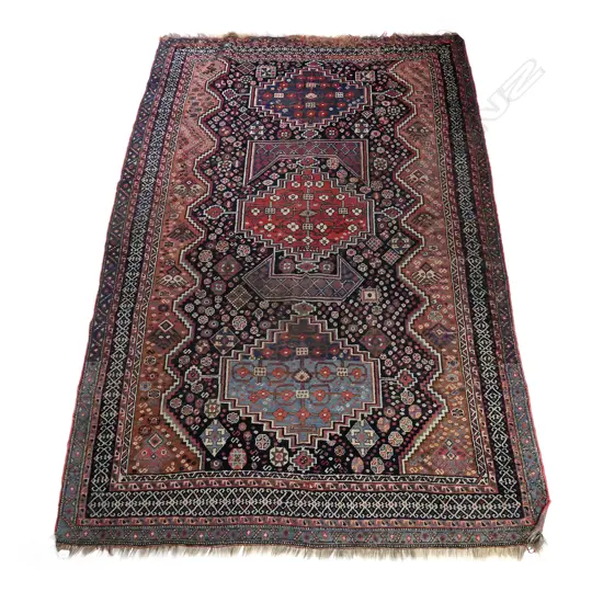 An old Afshari tribal hand knotted rug
