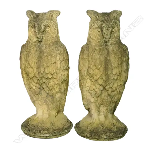 A pair of classical Church Stone owl garden ornaments