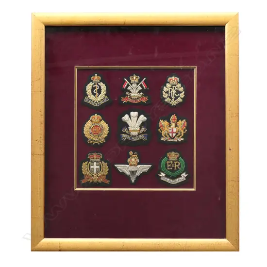 Nine bullion cloth badges of the RAMC; Royal Lancers; etc.
