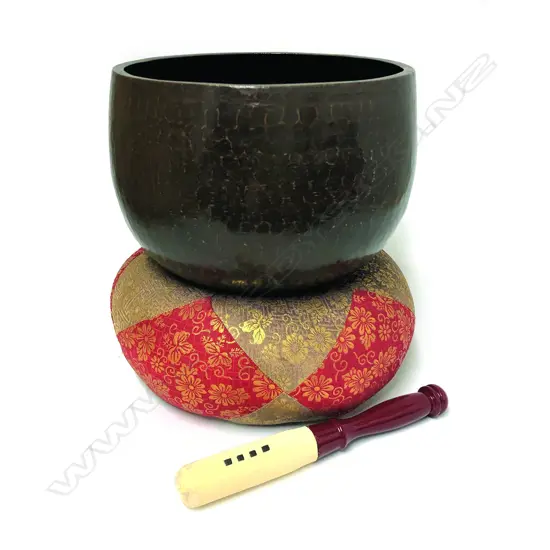 A Japanese bronze singing bowl