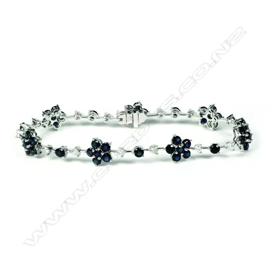 A 14ct white gold sapphire and diamond bracelet