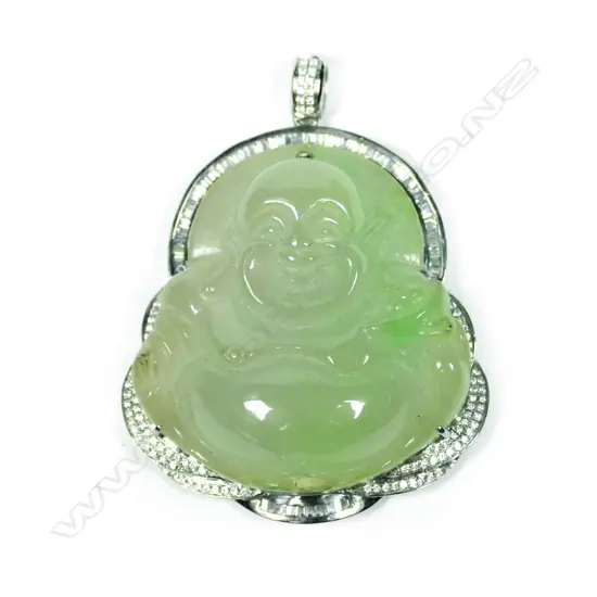 An 18ct white gold diamond and jadeite pendant