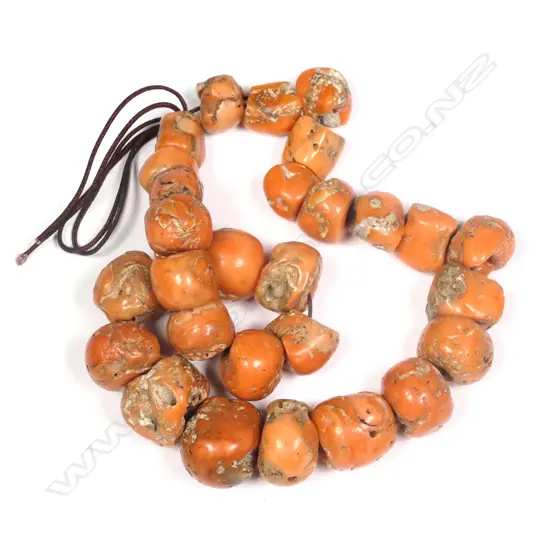 A vintage orange coral bead necklace