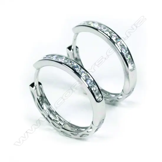 A pair of 14ct white gold diamond hoop earrings