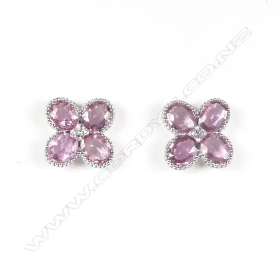 A pair of 14ct white gold Ceylonese sapphire and diamond stud earrings