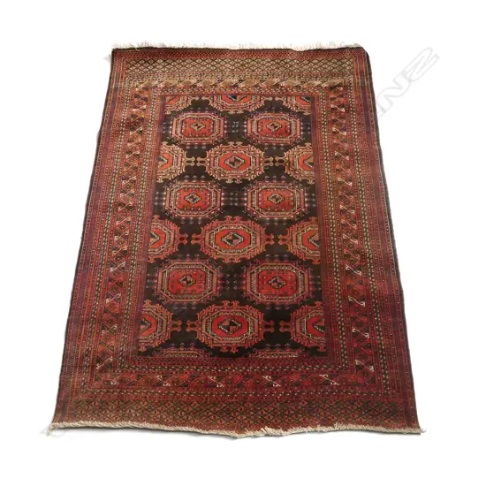 A Baluchi tribal hand knotted rug