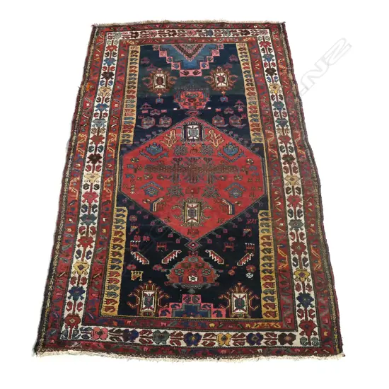 A Persian hand knotted rug