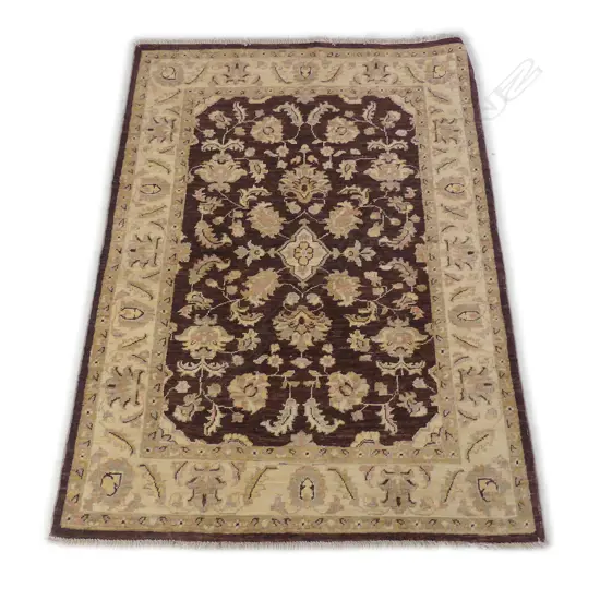 A hand knotted Chobi rug