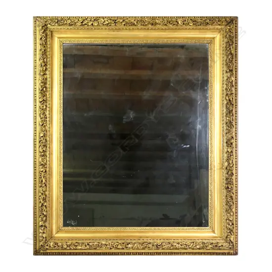 A good large Victorian carved gilt wood framed wall mirror