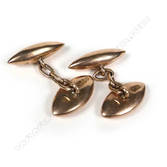 A pair of 9ct rose gold vintage cufflinks, plain lozenge and oval panel forms. 6gm.