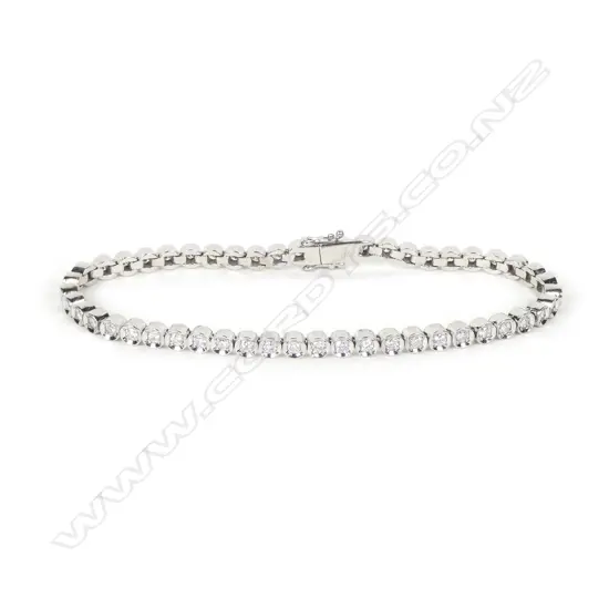 An 18ct white gold and diamond tennis bracelet