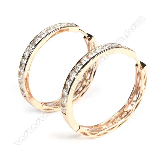A pair of 14ct rose gold diamond hoop earrings