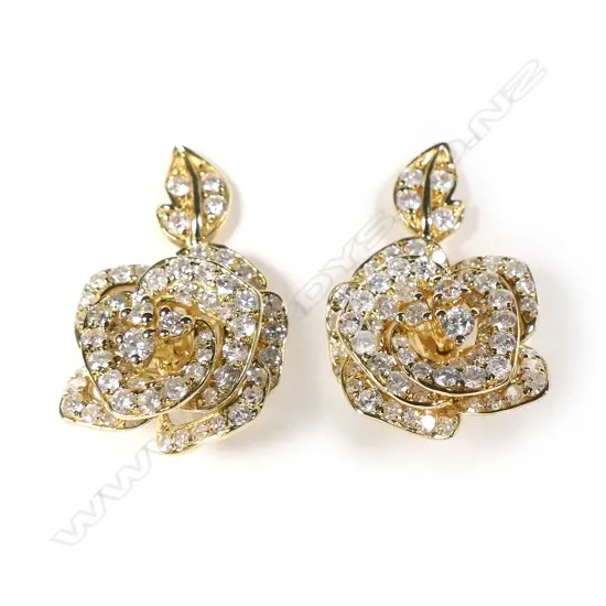 A pair of 18ct gold and diamond earrings