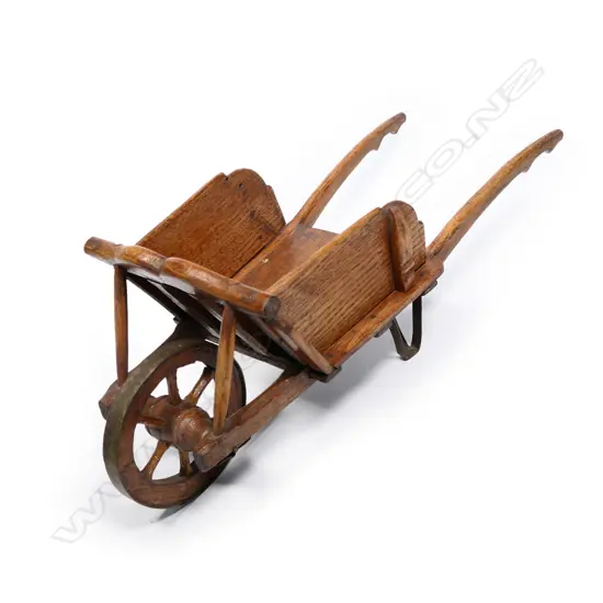 A Victorian folk art wheelbarrow