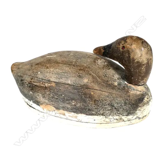A vintage 16" early Canvasback hollowed wooden decoy