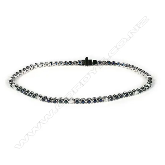 A 14ct white gold blue sapphire and diamond tennis bracelet