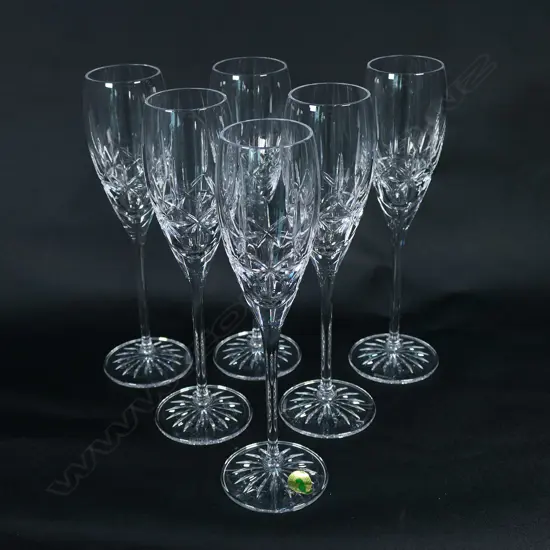 A set of six Waterford crystal champagne glasses