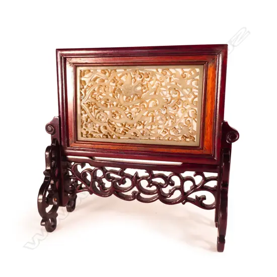A Chinese carved table screen