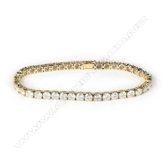 A 14ct yellow gold diamond tennis bracelet