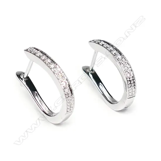 A pair of 9ct white gold and diamond earrings