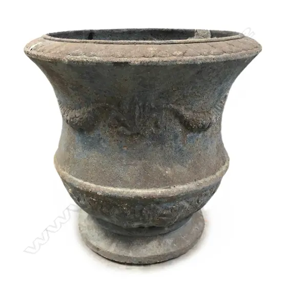 A rustic large pottery garden urn