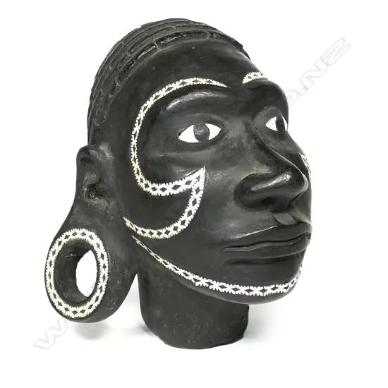 A Solomon Islands canoe prow figurehead (nguzunguzu),