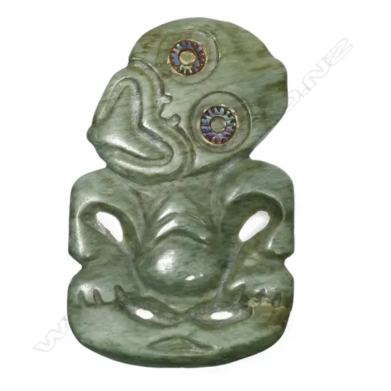 A double-sided pounamu hei tiki,