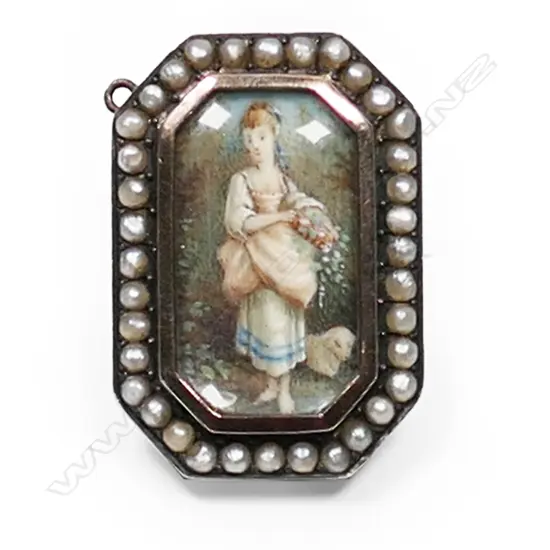 A Georgian silver and gold locket/brooch,