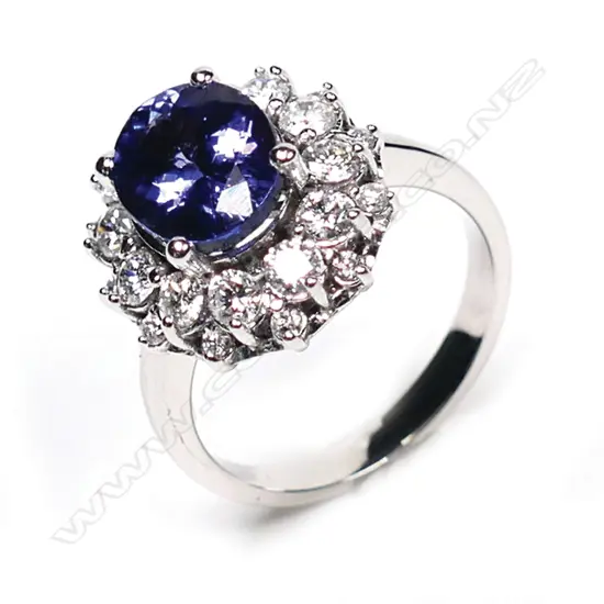 A 14ct white gold, tanzanite and diamond ring,