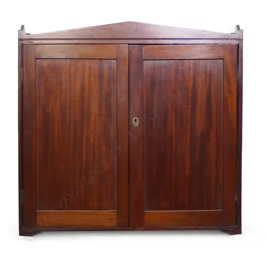 A small Georgian mahogany wall cabinet,