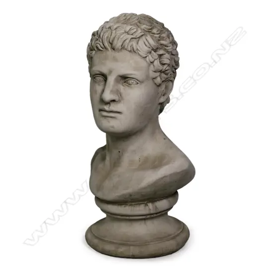 A cast concrete bust of a classical Roman young man