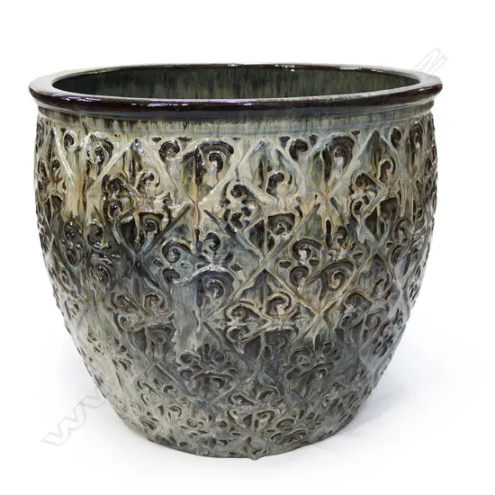 A large pottery garden pot,