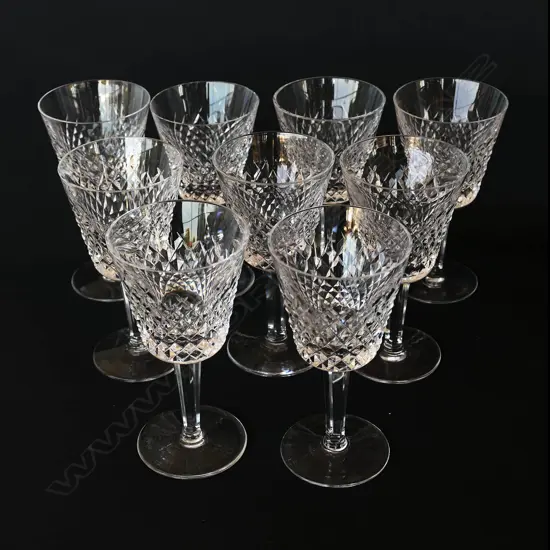 A set of nine Waterford crystal Alana diamond cut wine glasses,