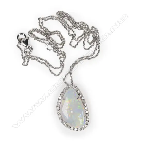 A 14ct white gold, Australian opal and diamond halo pendant,