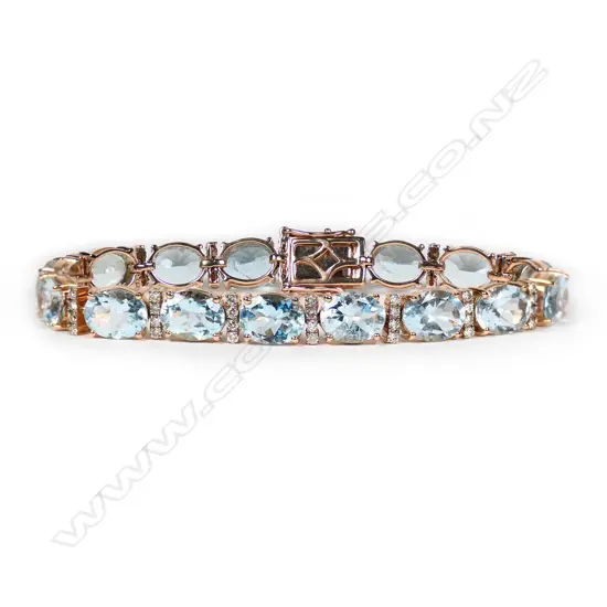 A 14ct rose gold, aquamarine and diamond, vintage style tennis bracelet,