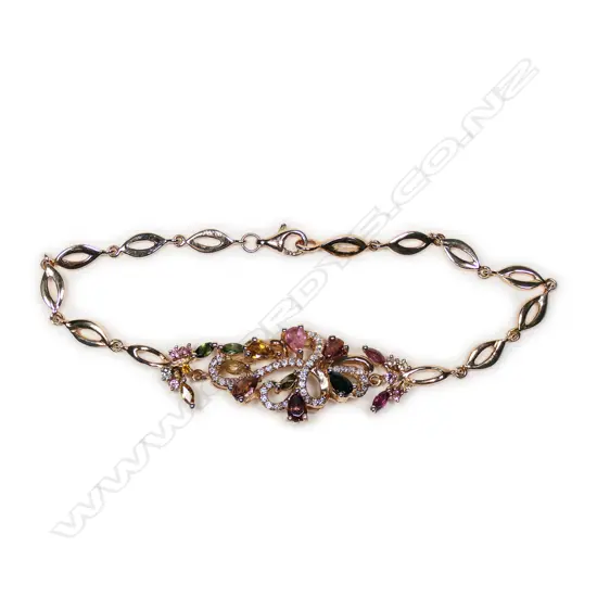 An 18ct rose gold, tourmaline and diamond bracelet,
