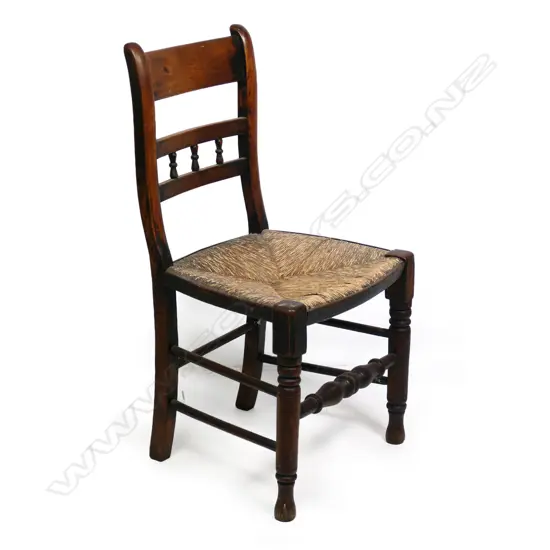 A 19thC mahogany rush seated chair,