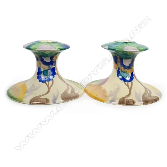 A pair of Clarice Cliff 'Bizarre' candle stands