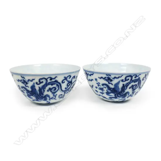 A pair of Chinese eggshell porcelain blue and white wine cups