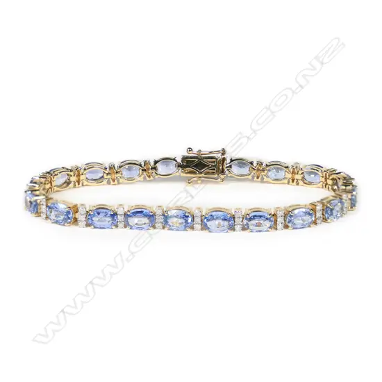 A 14ct gold, Ceylon sapphire and diamond line bracelet,