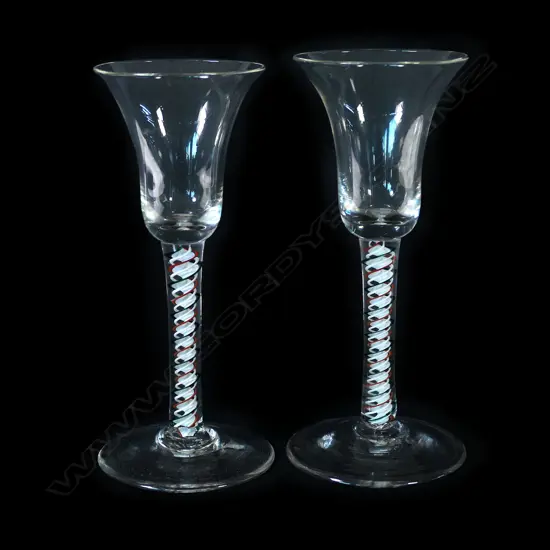A pair of antique style coloured air twist stem drinking glasses,