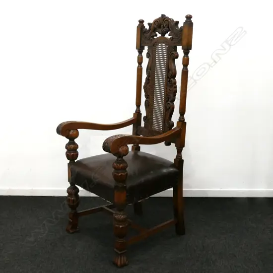 A Victorian oak Jacobean style baronial chair,