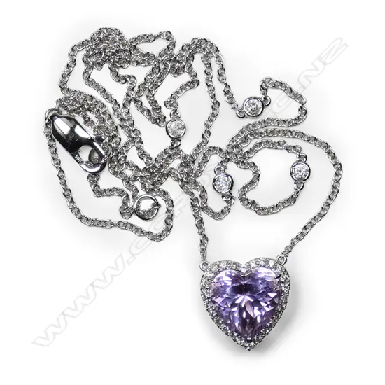 A 14ct white gold, kunzite and diamond heart necklace,